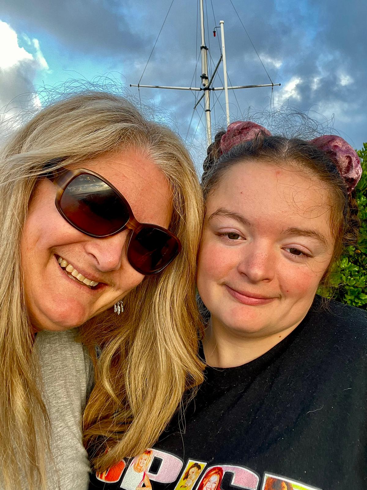 Michelle, founder of The Happy Human Hub, with her daughter Morgan